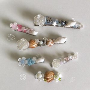 Kẹp vỏ sò ngọc trai nơ cườm